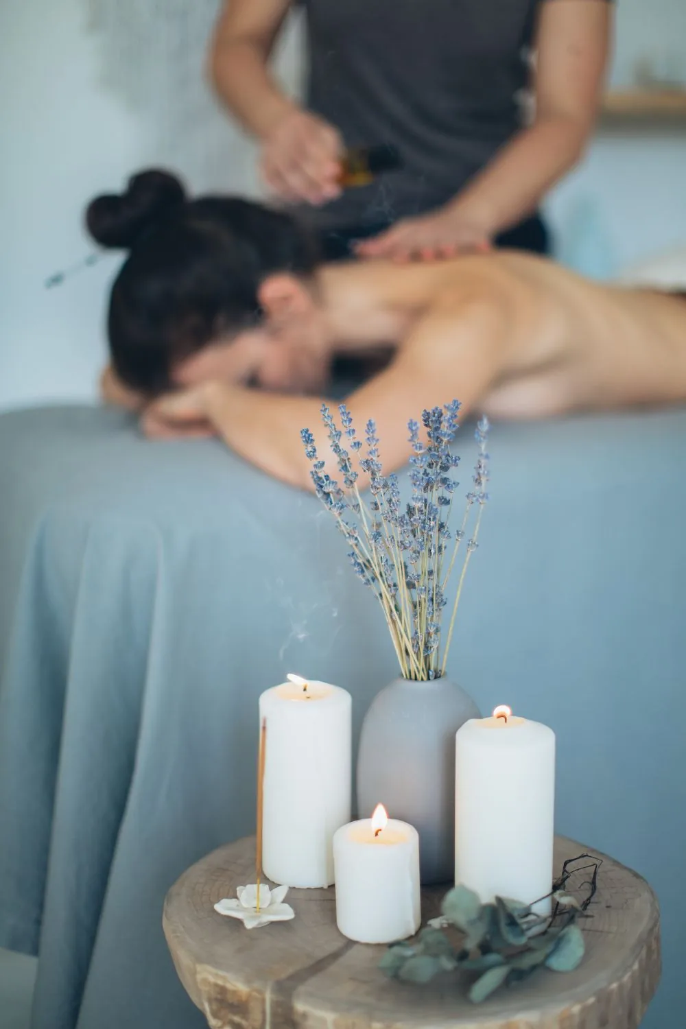 Candles and incense in a calm wellness treatment room